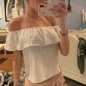 off the shoulder white ruffle shirt